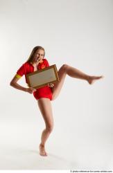 MARTINA BAYWATCH STANDING POSE WITH POINTER